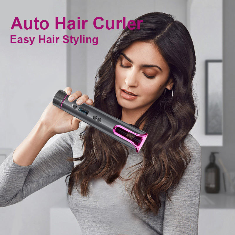 A Women is Styling Her Hair Using Cordless Automatic Hair Curler.