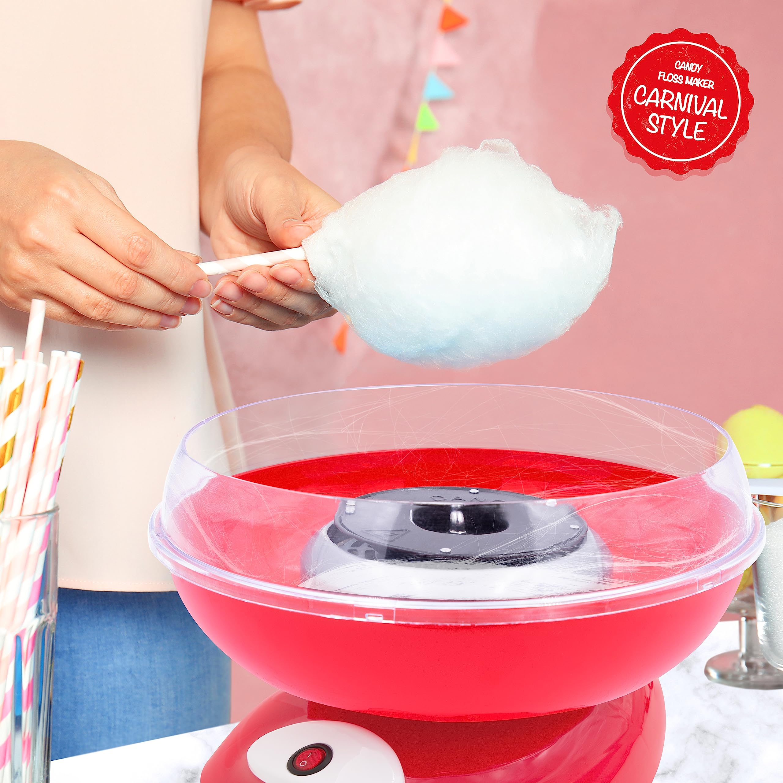 A Person is Making Cotton Candy Using Cotton Candy Maker.