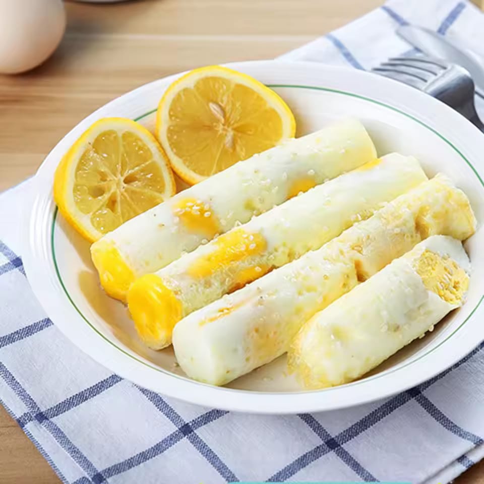 A Plate Of Egg Rolls Made Using Creative Egg Roll Maker.