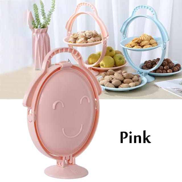 A Pink Creative Folding Fruit Plate.