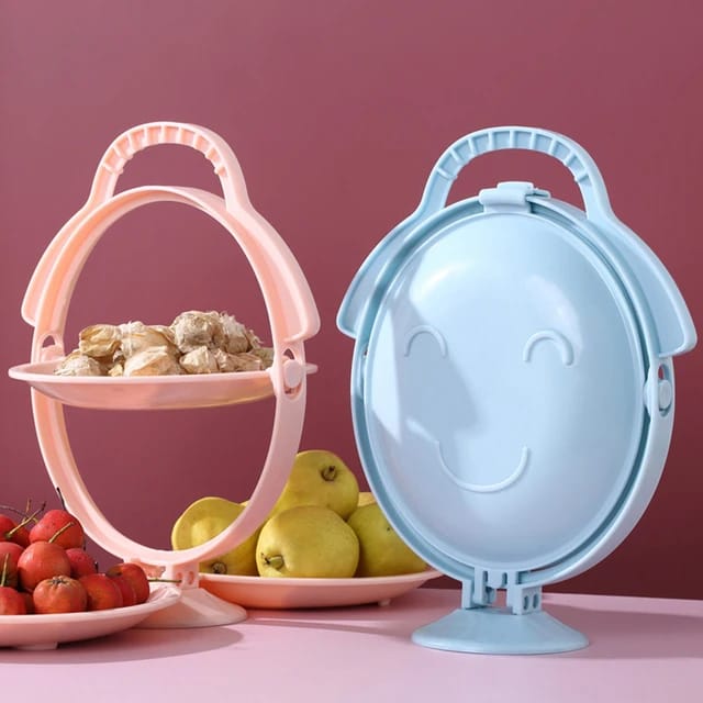 Fruits and snacks are arranged in a Creative Folding Fruit Plate.