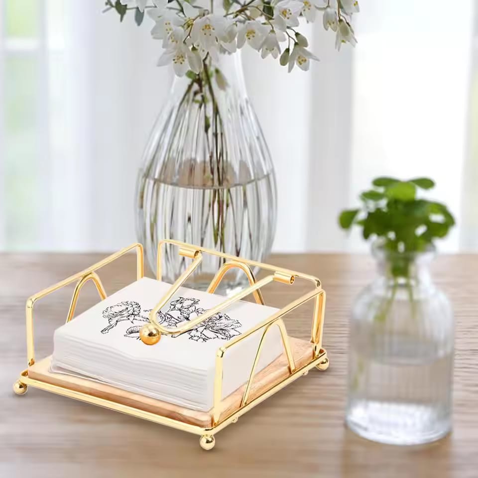 A Creative Paper Towel Dispenser is Filled With Tissues Placed On a Tabletop.