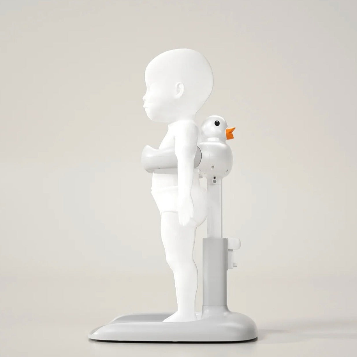 A Model Of Baby is Fixed on Cute Duck Baby Bathing Station.