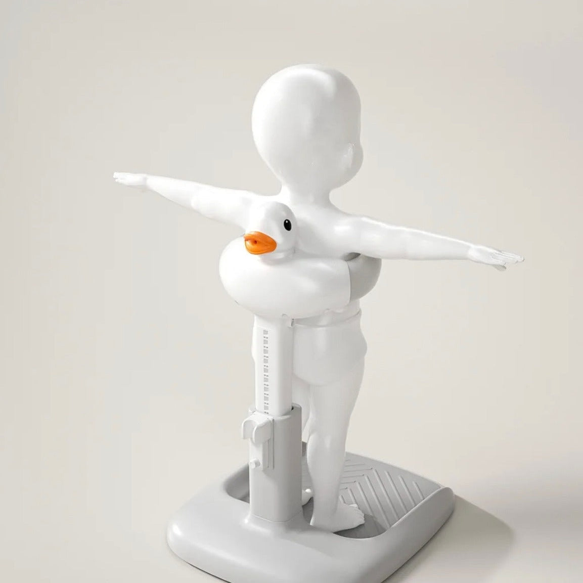 A Statue of Baby is Fixed on Cute Duck Baby Bathing Station.