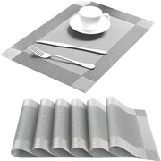 Dining Table Placemats with cutlery on a white background