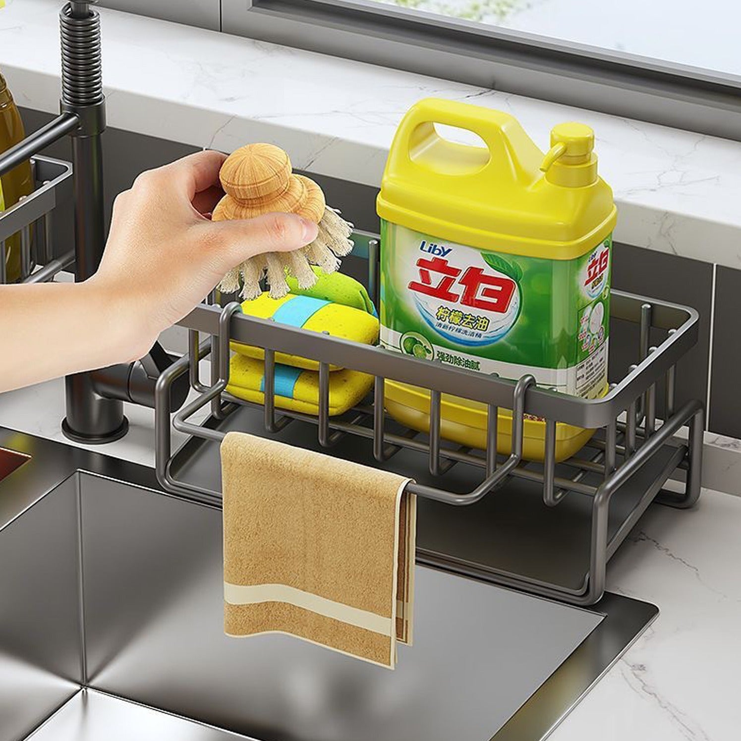 Someone placing something into the Rustproof Stainless Steel Sink Organizer Rack