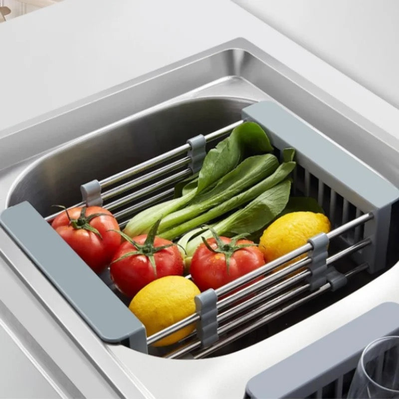 Expandable dish drying and washing basket with some items in it