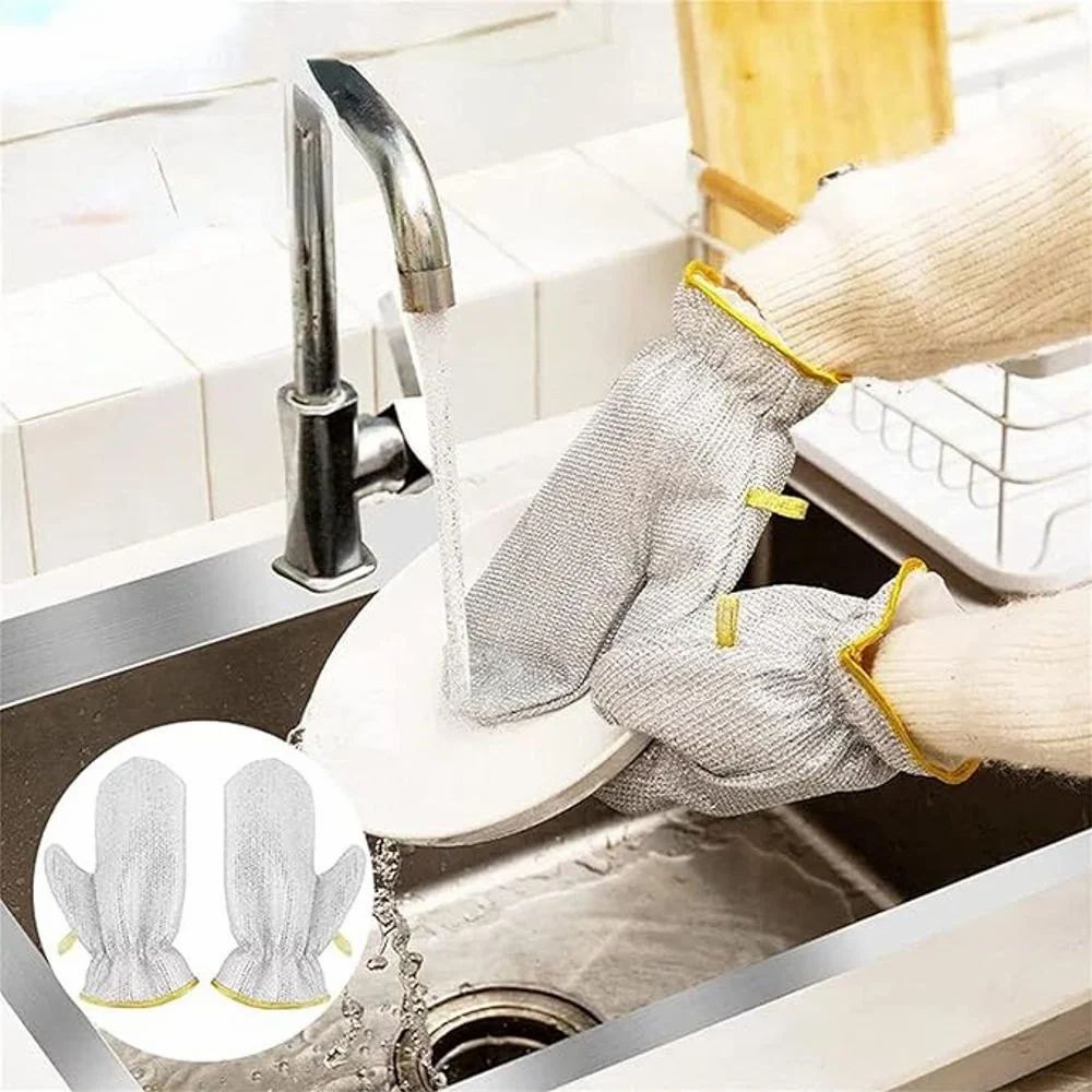 A Person is Washing Dish Using Dishwashing Kitchen Cleaning Wire Gloves.