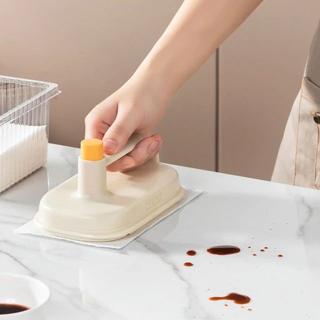 a man going to clean the dirt with Disposable Cloth Brush 