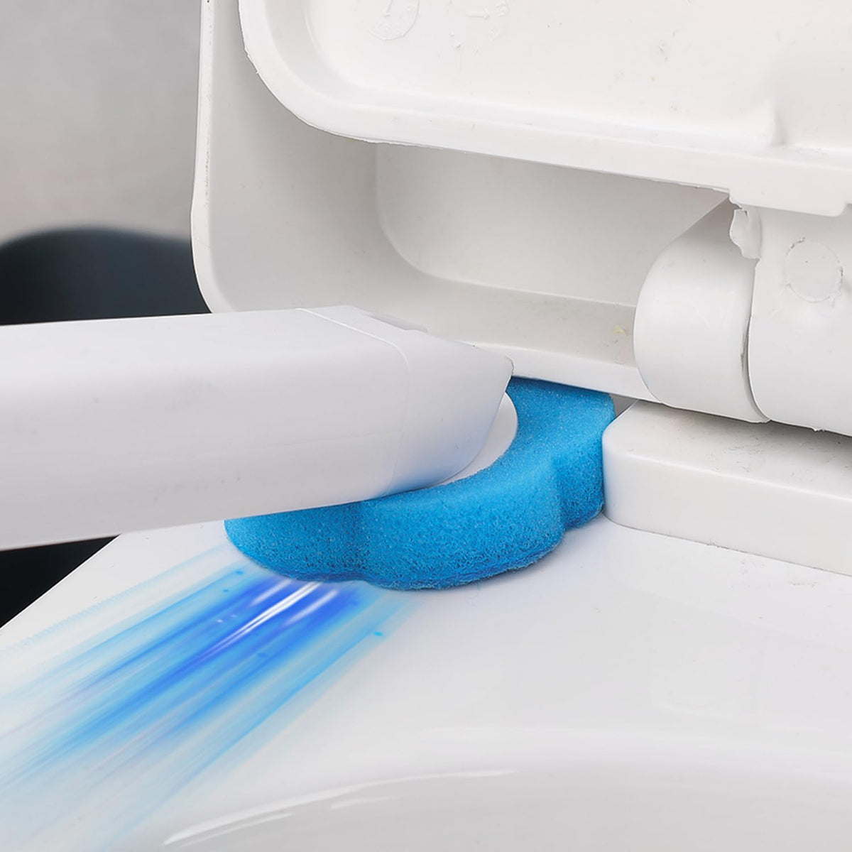 Disposable Head Toilet Cleaning Brush with Long Handle is used to clean the corner.