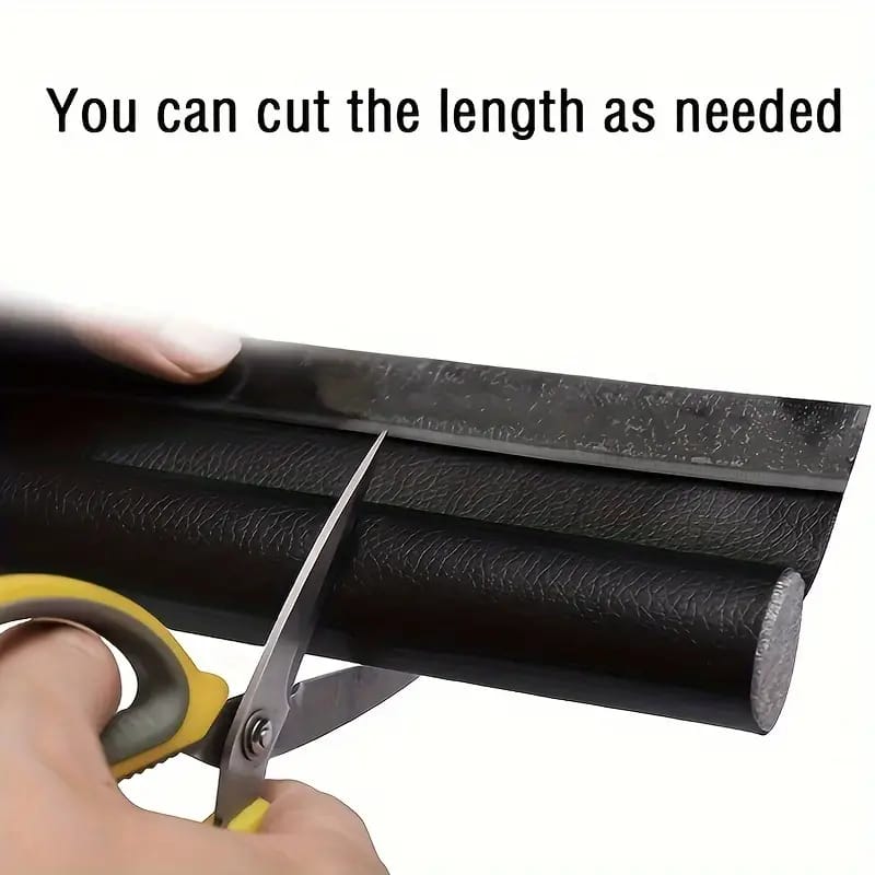 A Person is Cutting Door Seam Bottom Sealing Guard Strip.