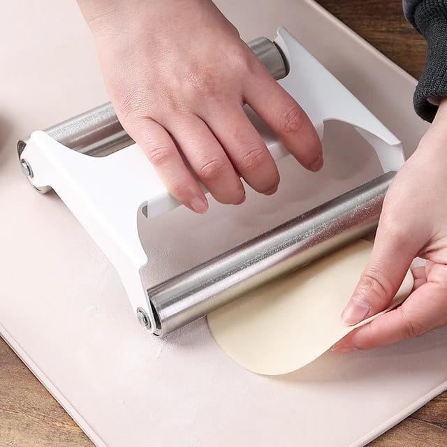 someone baking Dumplings using a Double-Sided Stainless Steel Dough Roller
