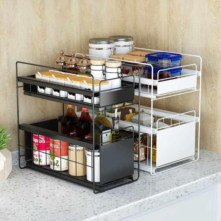 Black and white Under Sink Storage Rack with food and drinks placed in the designated space