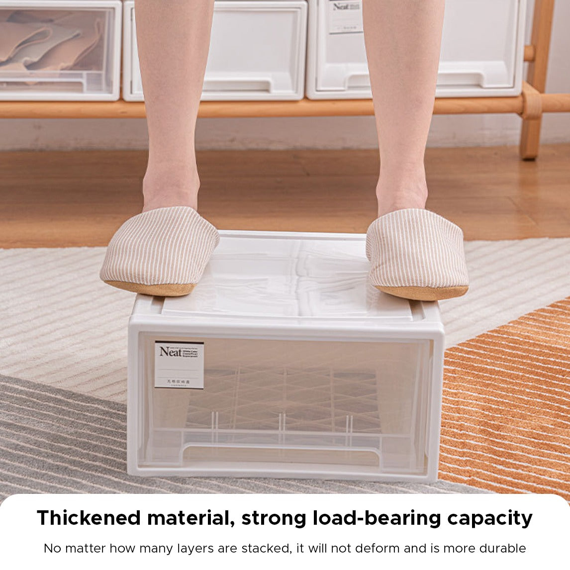A Woman is Standing On the Drawer Type Wardrobe Organizer Box.