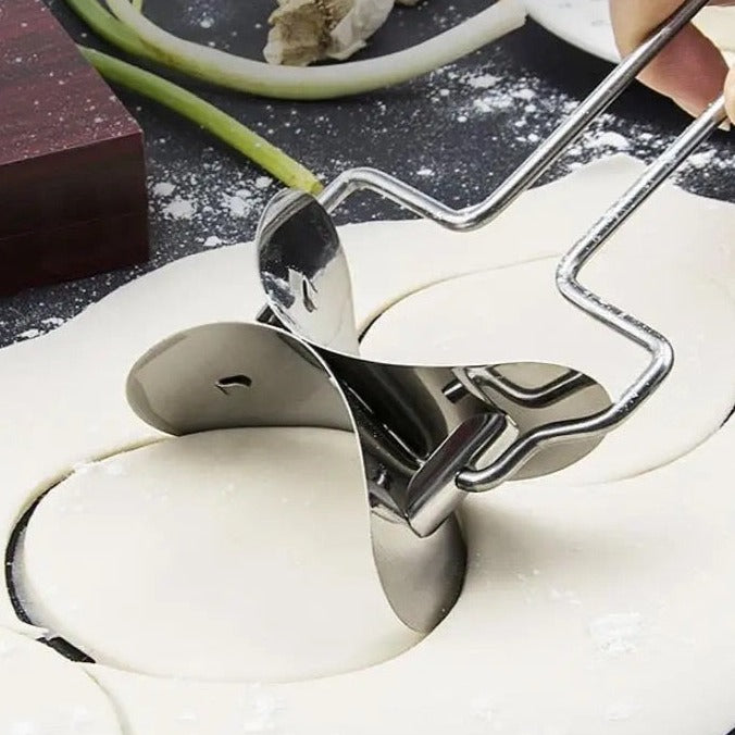 A Person is Cutting Dough Using Stainless Steel Dumpling Wrapper Maker.