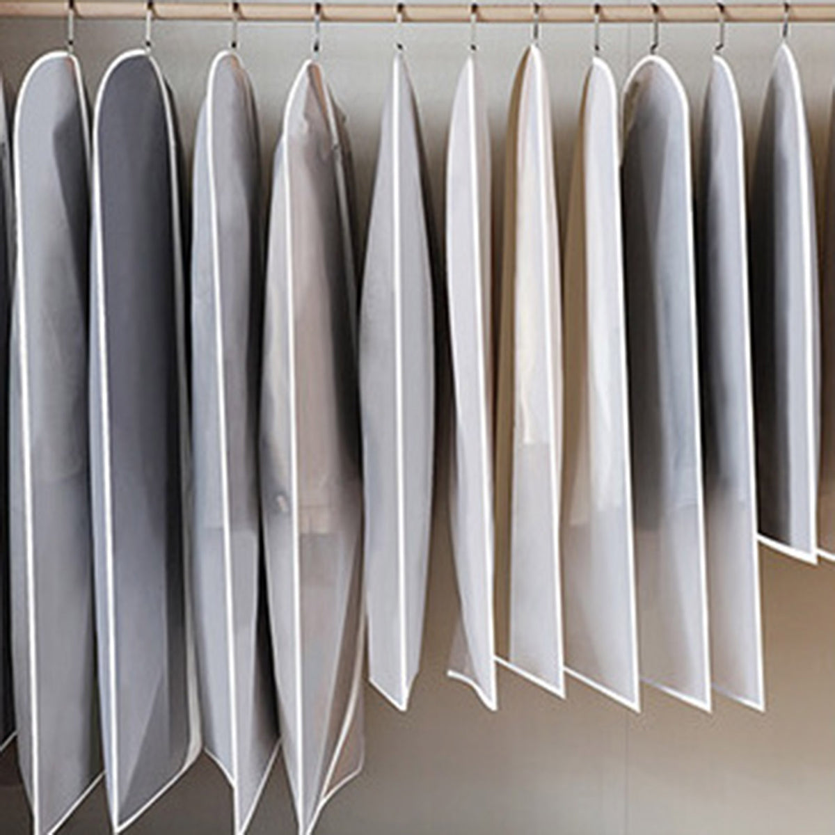 Hanging Garment Bags with some clothes
