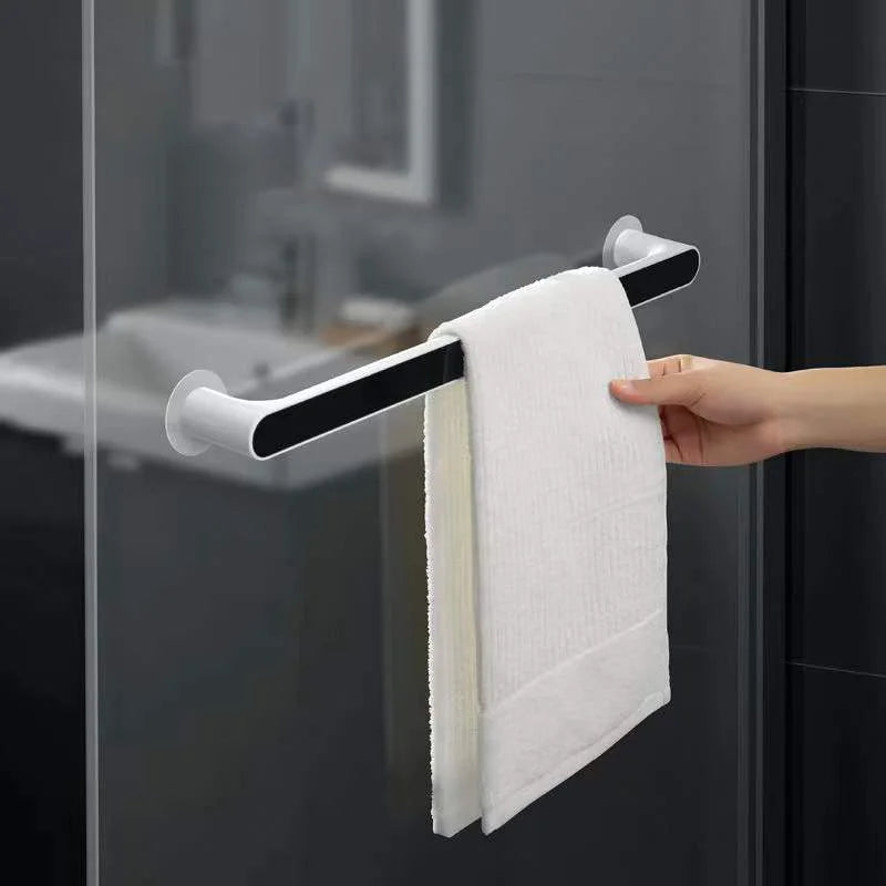 Someone is taking a towel from the Towel Organizer Hanger
