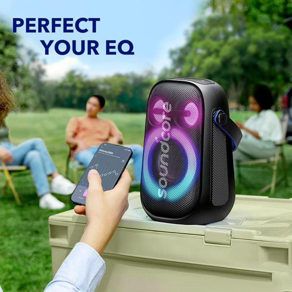 A Person Operating ANKER Soundcore Rave Neo 2 Speaker With Mobile Phone.