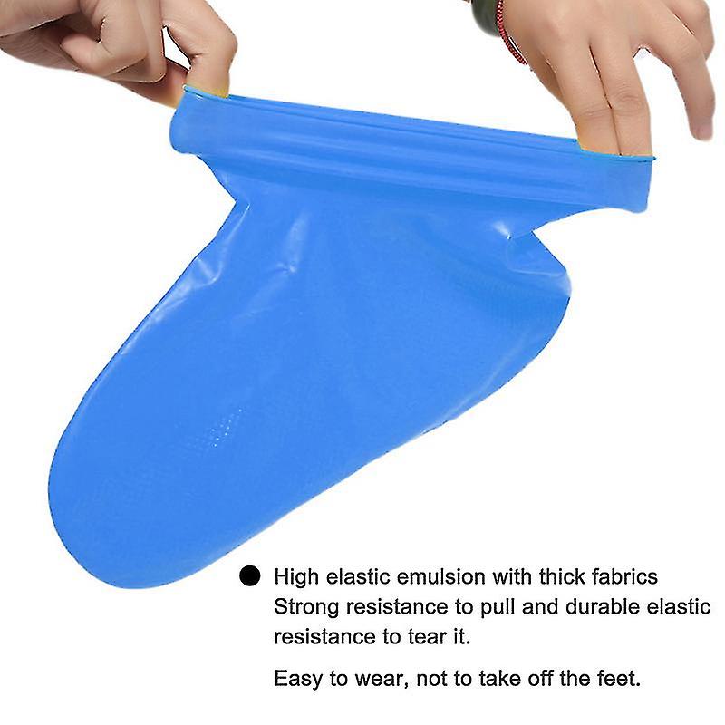 A Person is Testing the Elasticity of Silicone Waterproof Shoe Cover.