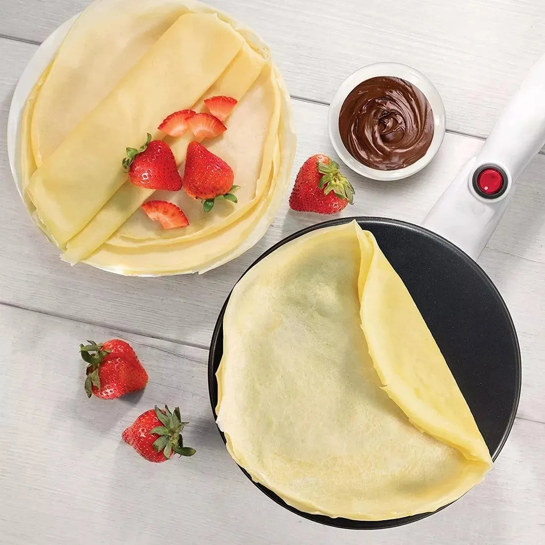 Crepes are Made Using Electric Crepe Maker.