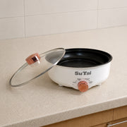 Electric Frying Pan in a kitchen countertop.