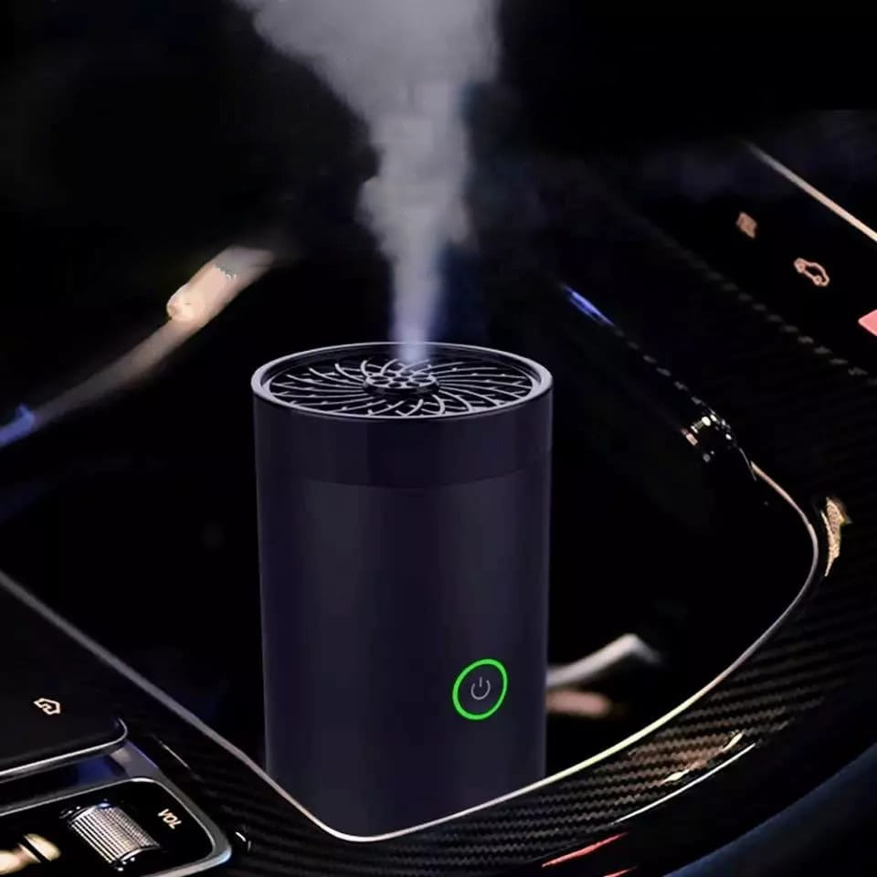 Electric Mini Incense Bukhoor Burner is Placed Inside a Car.