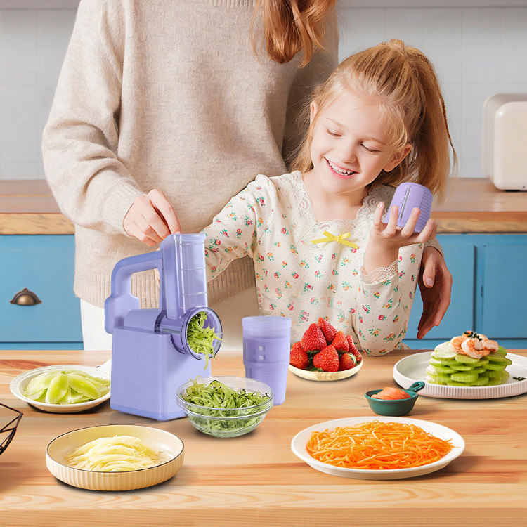 A Mom and Child is Engaged in Making Salad Using  Electric Vegetable Cutter & Salad Maker.