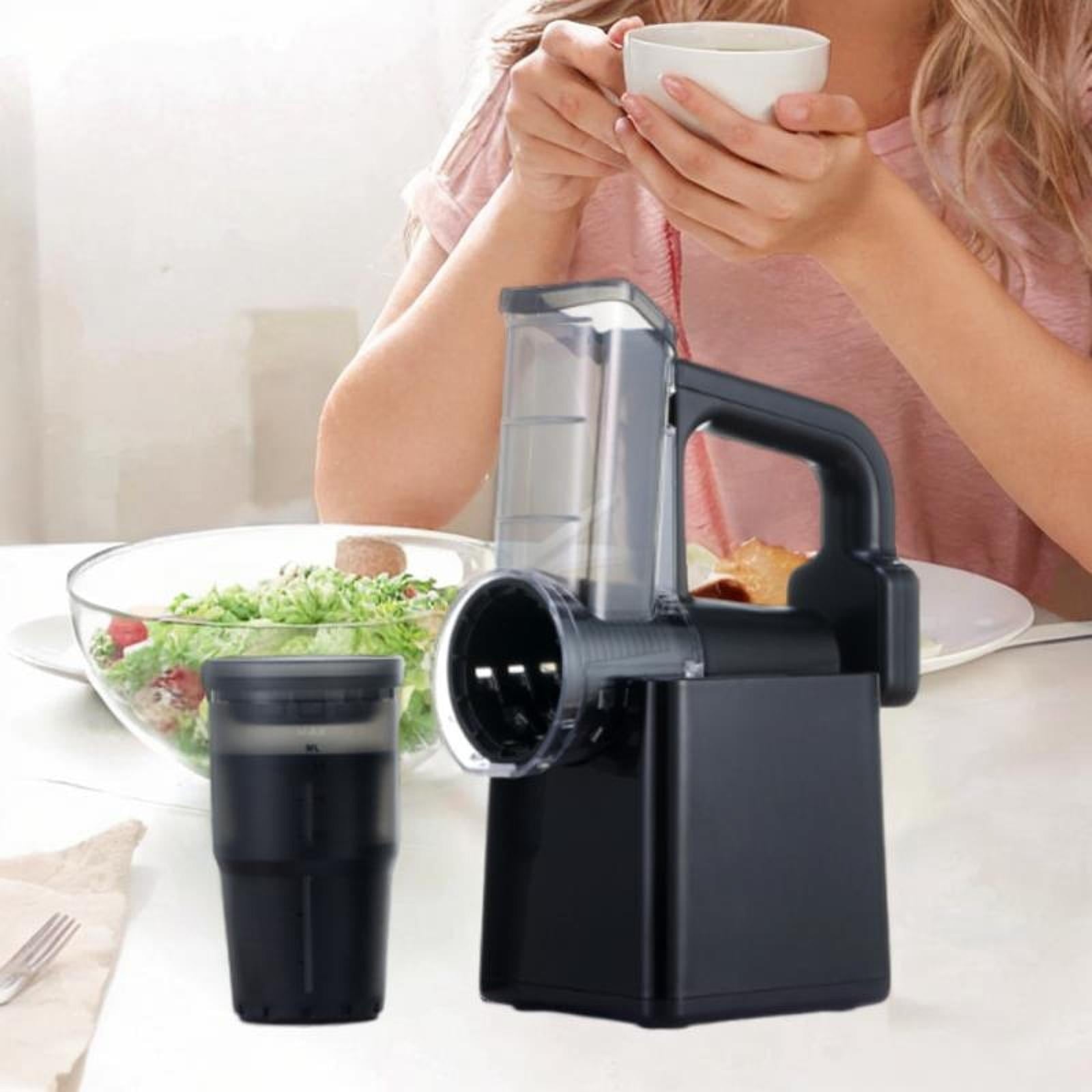 A woman is having tea and  Electric Vegetable Cutter & Salad Maker Placed Next to her.