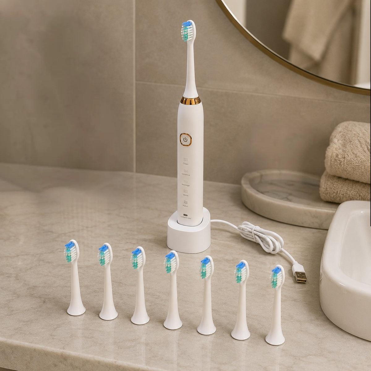 Electric toothbrush with multiple brush heads on a bathroom counter