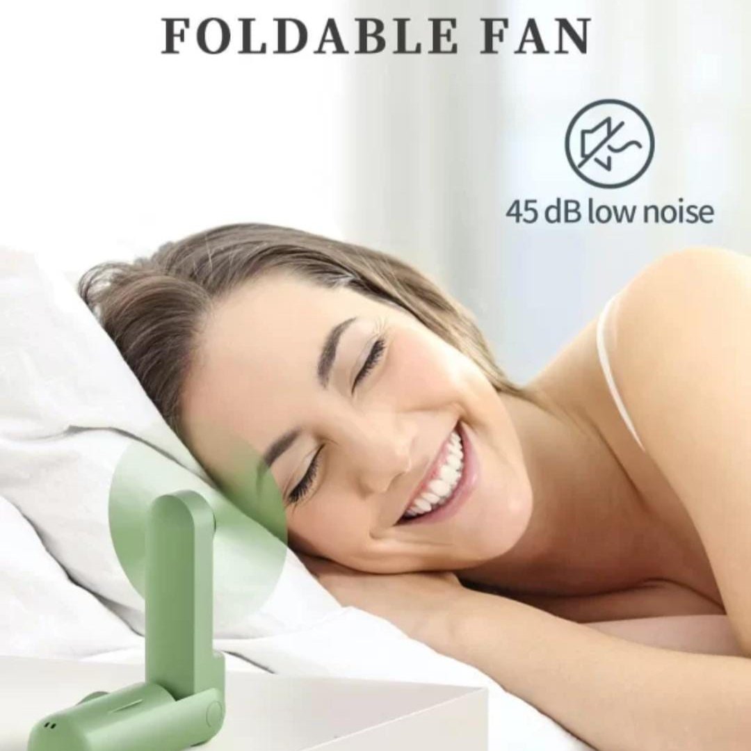 A Women Enjoys Multifunction Folding Mini Fan.