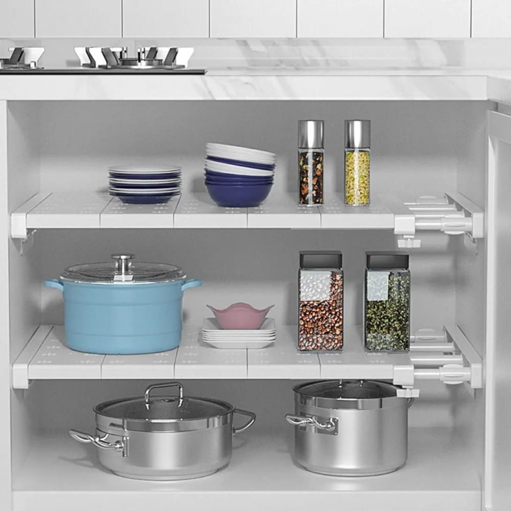 Expandable Closet Tension Shelf Divider with something arranged on it