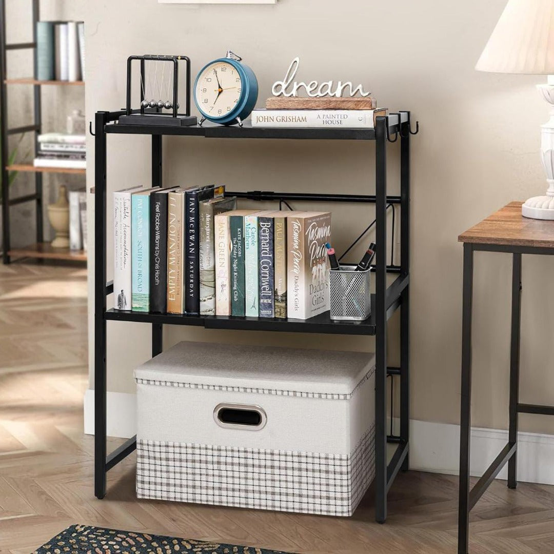 A Expandable Microwave Oven Rack Shelf is Placed at Living Area and Organized with Books.