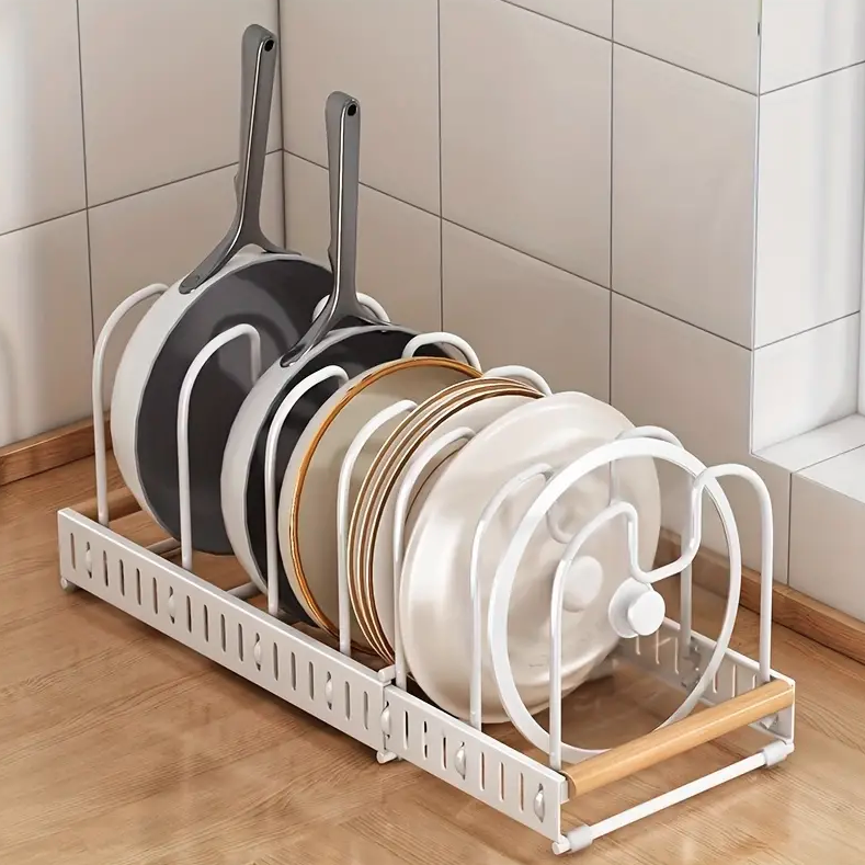 Expandable Pot and Pan Organizer Rack Organized with Pans and Plates.