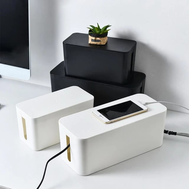 A Phone is Charging By Placing  Charger on Extension Socket Storage Box.