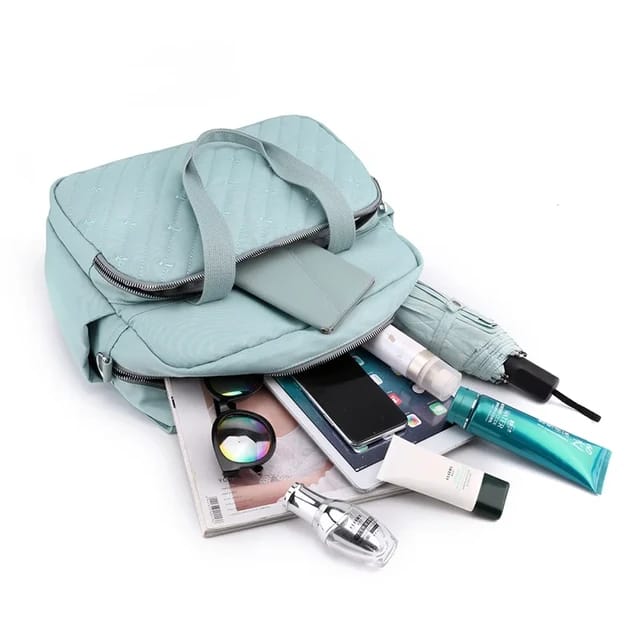 A Women Shoulder Bag with Essentials.