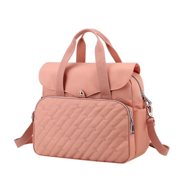 A Peach Fashionable Baby Diaper Bag.