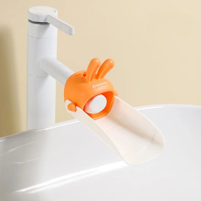 A Faucet Extender for Toddlers is Connected to Water Tap.