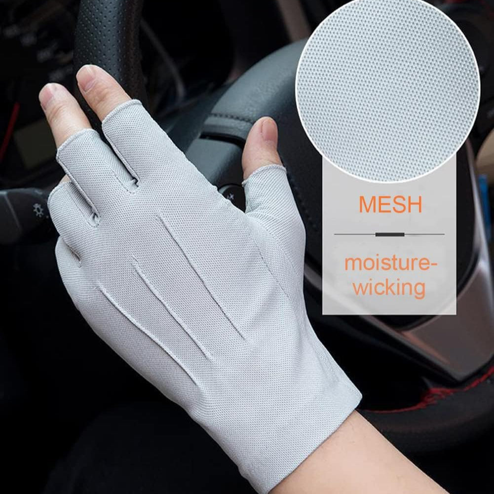 A Person is Wearing Fingerless Gloves While Driving.