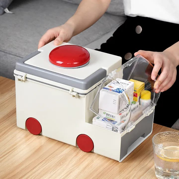 A Women is Taking Medicine From First Aid Kit Medicine Storage Box.
