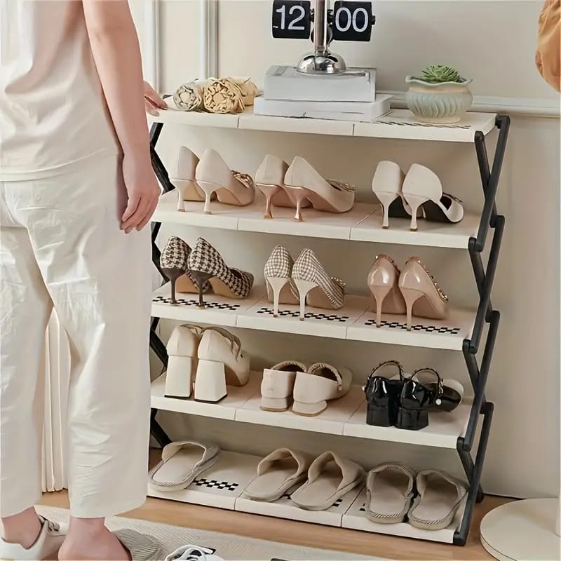 A person standing next to the Foldable Multi Layer Shoe Rack Shelf