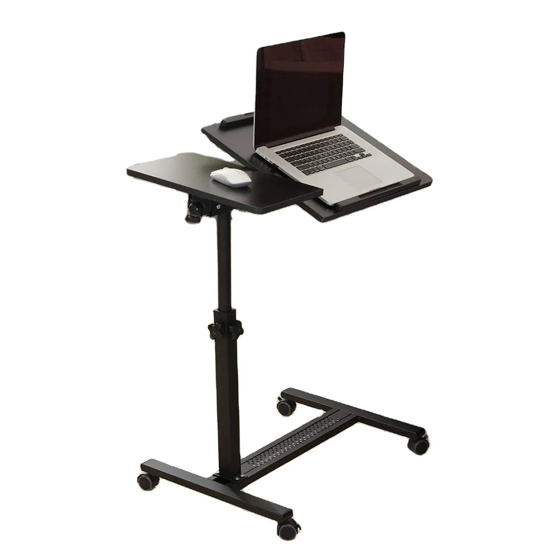 A black Adjustable Overbed Laptop Stand Table with a laptop placed on top