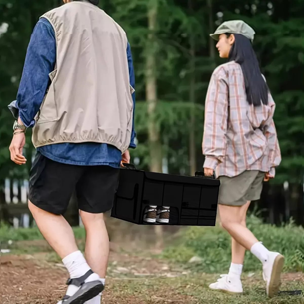 A Couple is Carrying Foldable Car Storage Box.