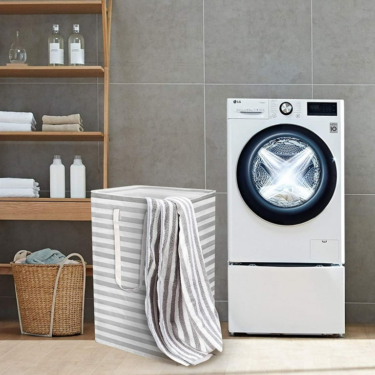 Foldable Cloth Storage Laundry Bin Beside a Washing Machine.