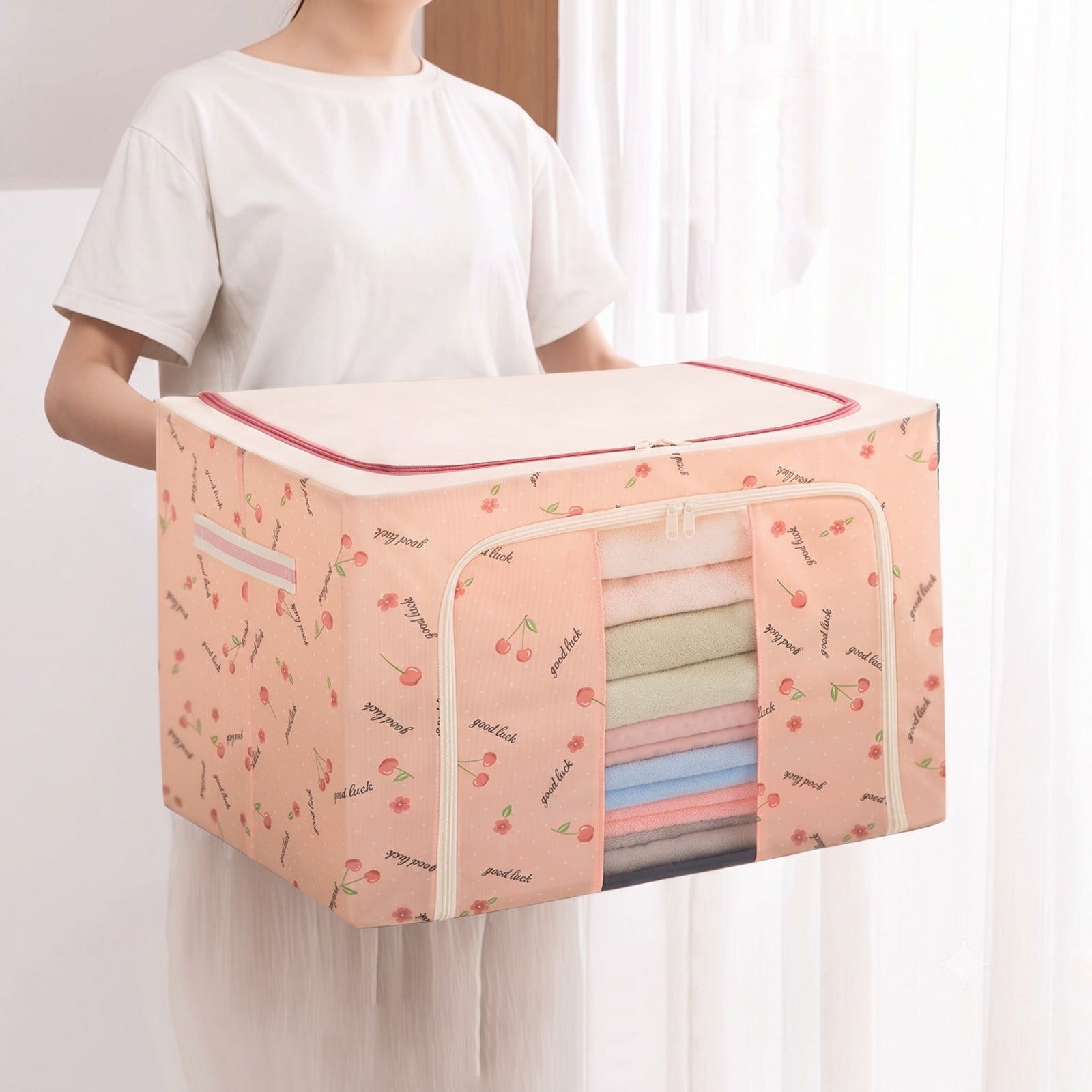 A Woman is holding Foldable Cloth Storage Organizer.