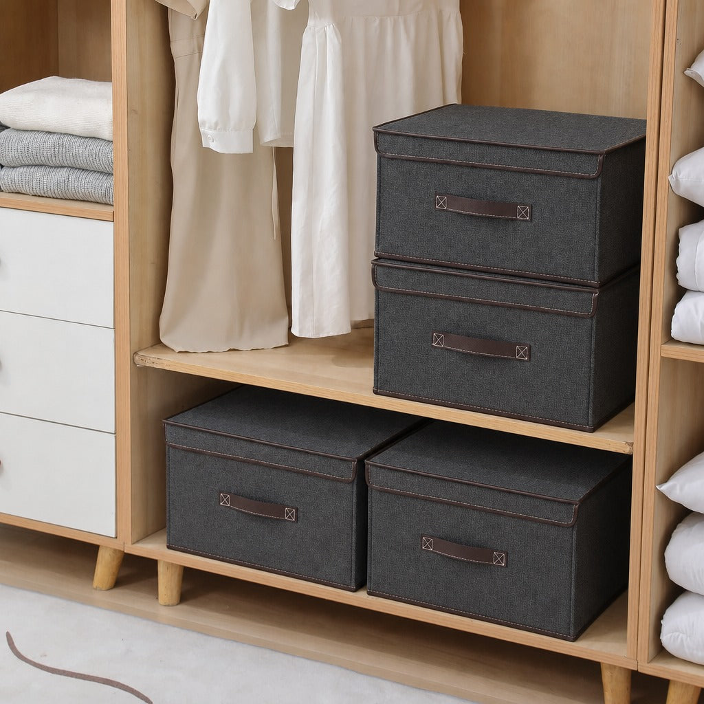 Foldable Fabric Storage Boxes with brown handles on a wooden shelf with clothes in the background.