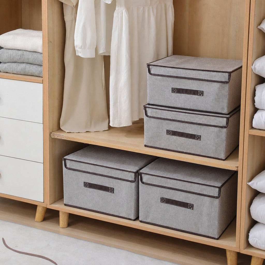 Foldable Fabric Storage Boxes on a wooden shelf with clothes in the background