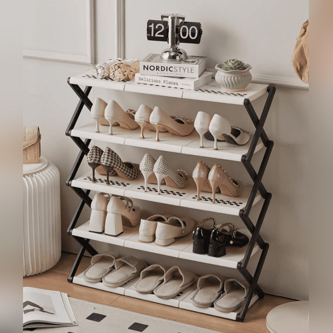 Foldable Multi-Layer Shoe Rack Shelf placed on the floor with some shoes and chappals