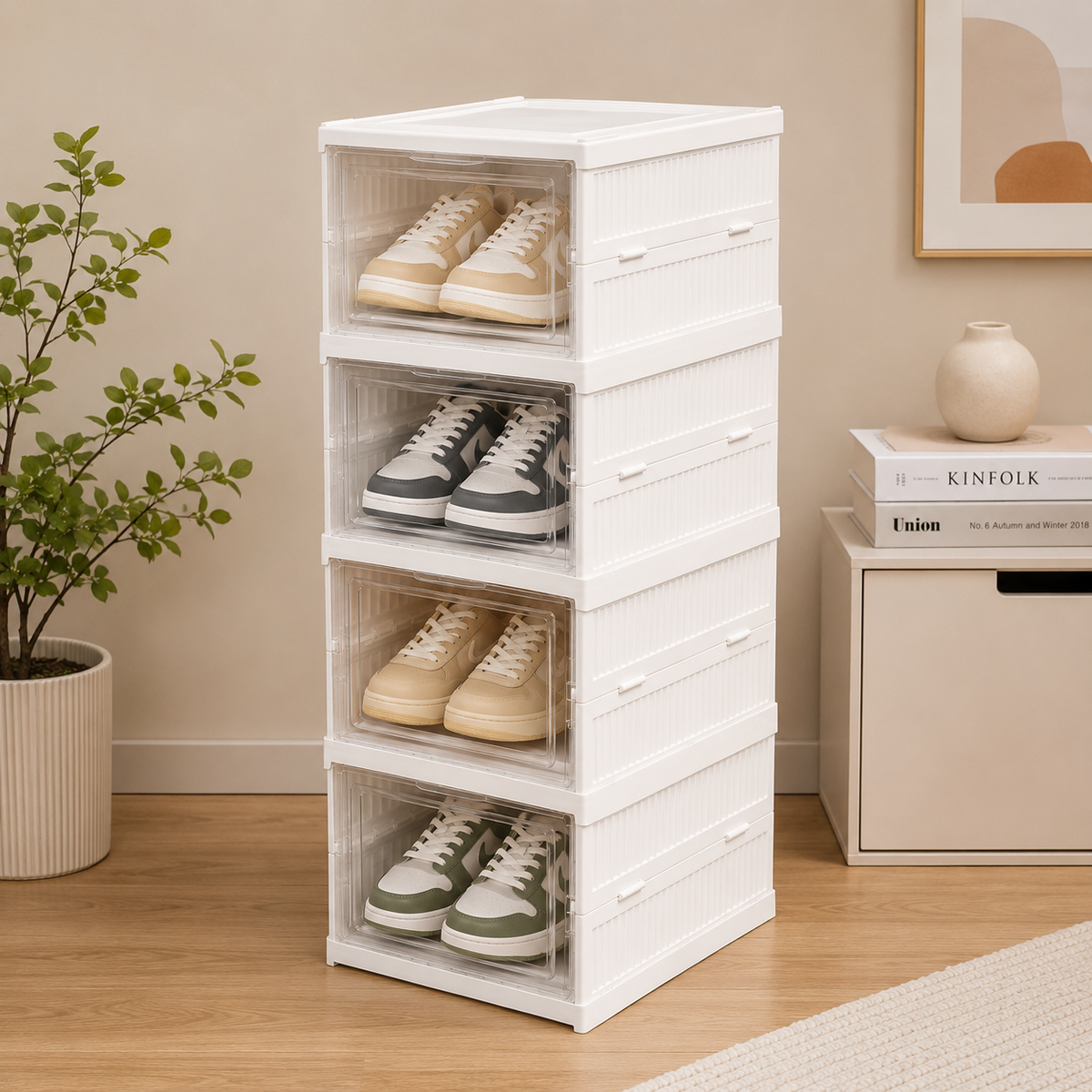 Stack of white shoe storage boxes with shoes inside, placed on a wooden floor.