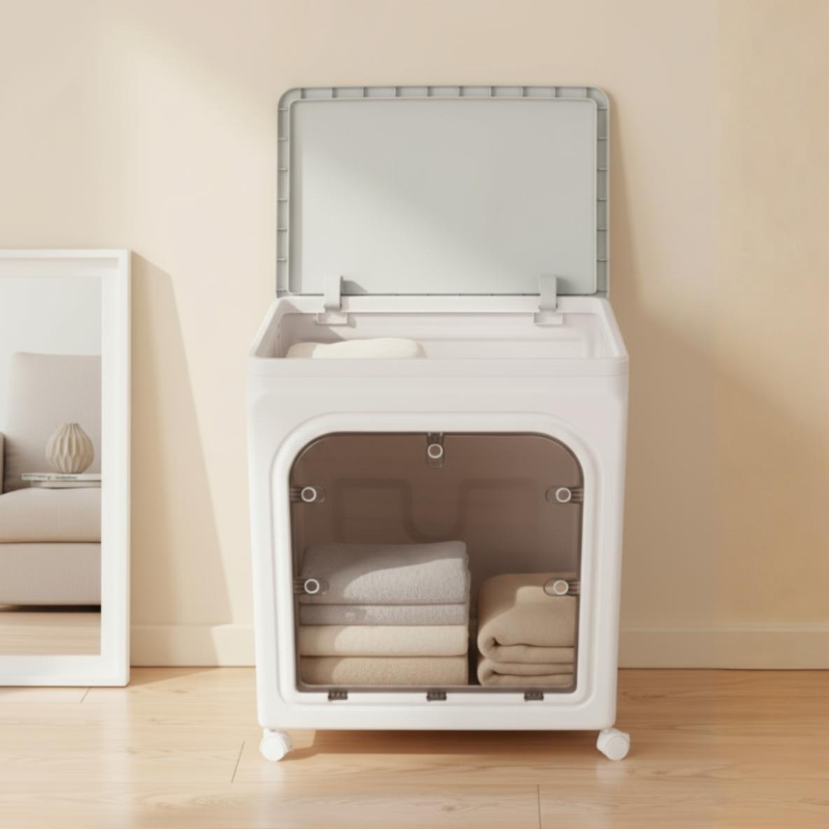 A Foldable Storage Box is arranged with clothes.