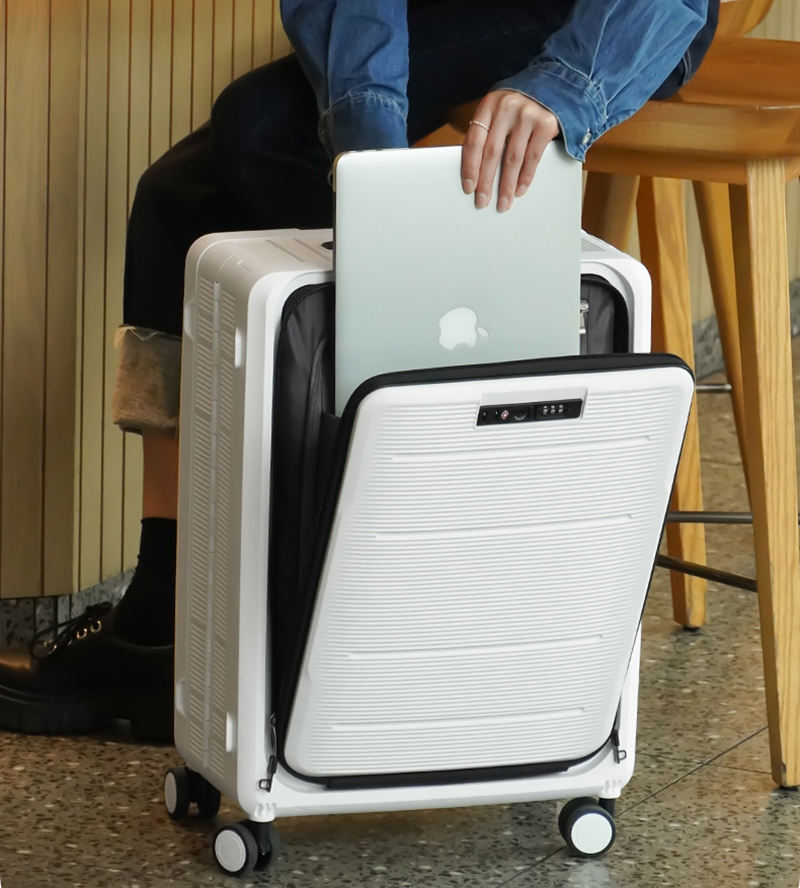 A Person is Keeping PC in a Foldable Travel Trolley Luggage Bag.